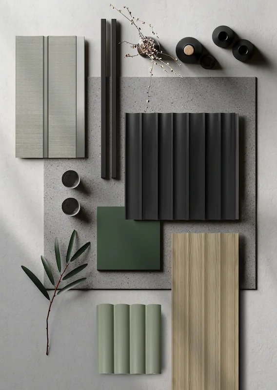Kombination aus geriffelten Akustikpaneelen, Holztexturen und Farbmustern in Grün und Grau auf einer Steinplatte.